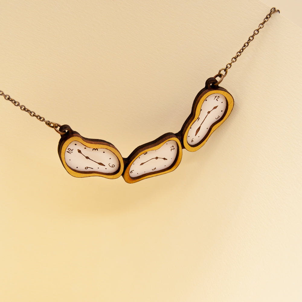 Soft clocks necklace Materia Rica